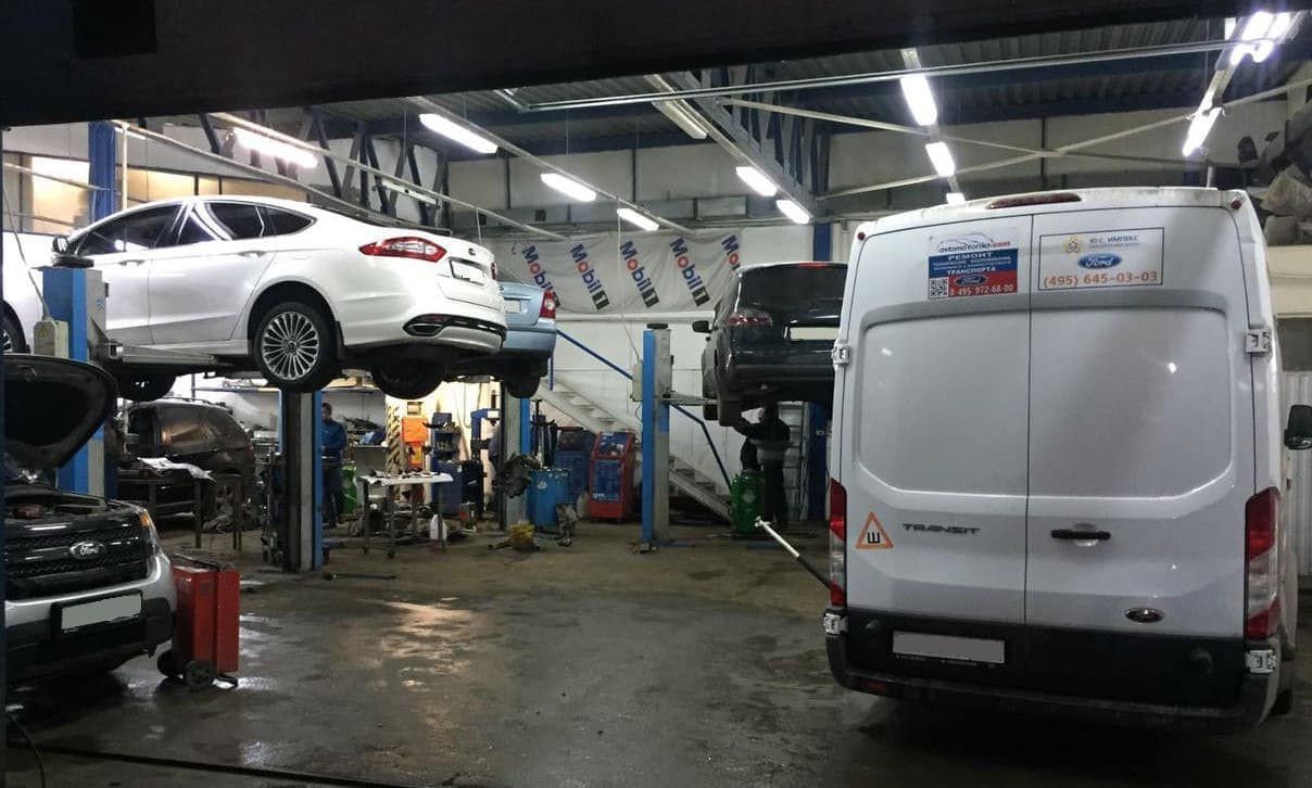 A close-up of a mechanic's hands.